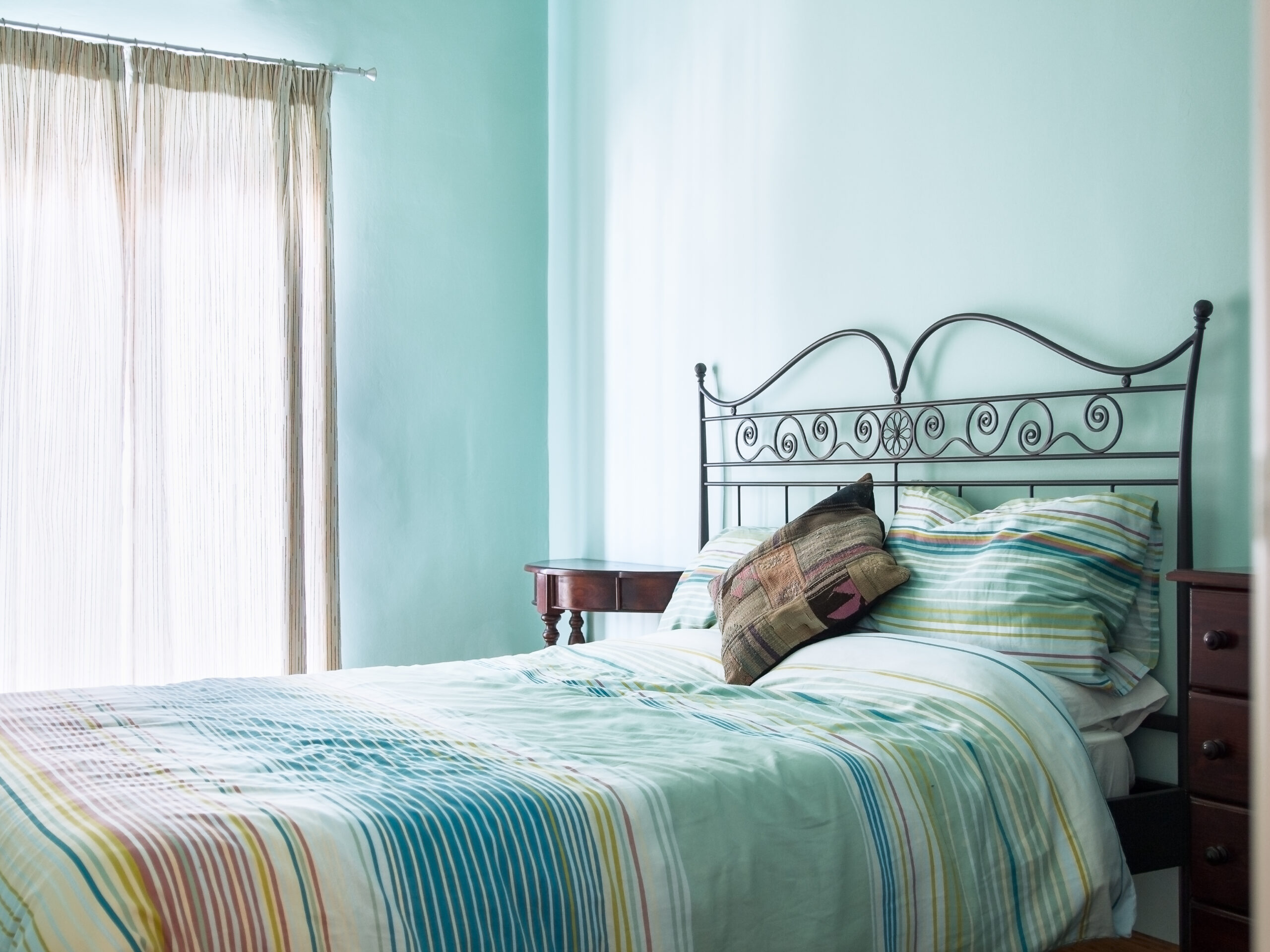 Bright, airy bed and breakfast bedroom.